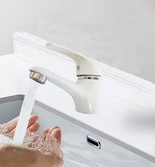 white basin faucet